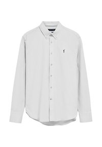 Vit långärmad skjorta med krage, knäppning fram och subtil logotyp i marinblått på vänster bröst. Slät bomullstyg med en klassisk design.