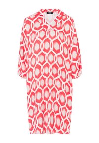 Rood-witte tuniekjurk met een V-hals en driekwart mouwen, voorzien van elkaar overlappende hexagonale ontwerpen en een losse pasvorm.