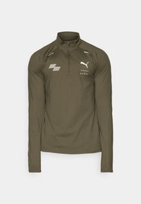 Olijfgroen sporttop met lange mouwen en halve rits, Puma-logo en witte accenten. Heeft een gladde stof en een aansluitend ontwerp voor sportkleding.