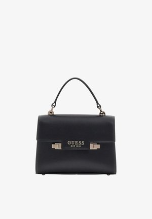 Sac à main Guess noir avec poignée supérieure, forme rectangulaire, fermoirs à tourniquet argentés et logo "GUESS EST 1981" sur le rabat avant.