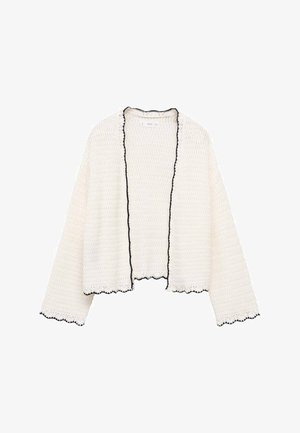 Hvid strikket cardigan med åben front, lange ærmer og sort bølget kant på kanter og manchetter.