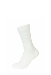 Calzino bianco in cotone con texture a costine e punta rinforzata. Design standard adatto per l'abbigliamento casual.
