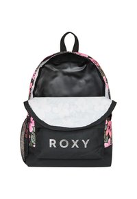Black backpack with floral pattern, silver logo "ROXY," zipper closure, mesh side pocket, and a spacious, lined interior. Textured fabric.