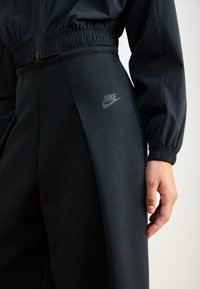 Nike Sportswear SPORTSWEAR TECH FLEECE - Treniņtērpa apakšdaļas - black