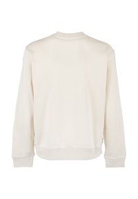 Pullover in crema con scollo rotondo, polsini e orlo a coste. Texture liscia, vestibilità rilassata, senza schemi o decorazioni visibili.