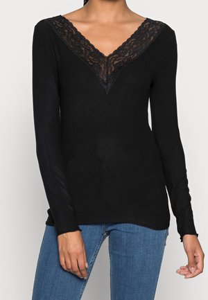 Långärmad tröja - black