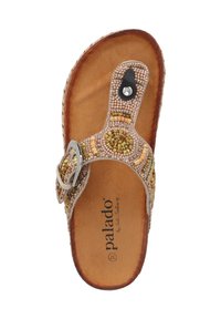 Sandal con infradito in pelle color beige. Caratterizzato da un intricato design di perline con motivi circolari e un elegante fermaglio in argento.