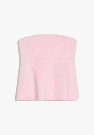 Dames lichtroze top zonder bandjes met een aansluitend bovenstuk en een uitlopende peplum-stijl zoom.