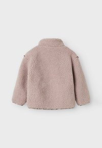 Faux-shearling jacket in soft pink with a high collar, dropped shoulders, and textured, fleecy fabric. Plain design with no visible fastenings.