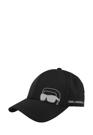 Schwarze Baseballkappe mit weißer Umrisszeichnung einer Sonnenbrille und eines Headsets auf der Vorderseite, "KARL LAGERFELD" Schriftzug an der Seitenpartie.