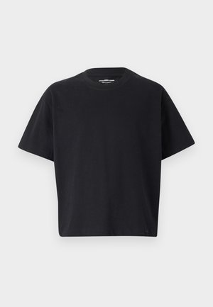 Svart t-skjorte med korte ermer laget av bomull, med rund hals og en avslappet, firkantet passform. Glatt tekstur, minimal design og uten mønstre.