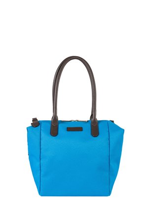 Blue fabric tote bag with two dark brown leather handles and zipper closure on top against white background.