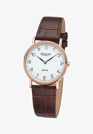 Montre-bracelet analogique classique avec cadran blanc, chiffres noirs, boîtier doré et bracelet en cuir marron affichant l'heure à 10:10:08.