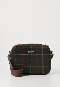 Small rectangular crossbody bag with dark green, red, yellow, and white plaid fabric, brown strap, and gold Barbour logo plate.