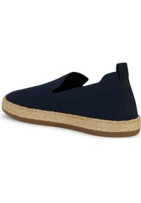 Zapatos de slip-on en color marino con parte superior texturizada, paneles laterales elásticos y suela de esparto trenzado con base de goma para mayor tracción.