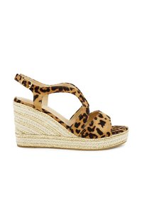 Leopard print wedge sandal with a suede upper, open toe, and ankle strap. Features a jute-wrapped wedge and soft beige insole.