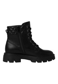 Bottines noires avec une partie supérieure matelassée, dotées d'un laçage à l'avant et d'une fermeture éclair sur le côté, semelle épaisse avec un motif de traction robuste.
