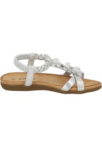 Sandali argento con cinturini intrecciati e decorazioni floreali. Soletta morbida color tan, suola in gomma con texture a trama. Cinturino alla caviglia regolabile.