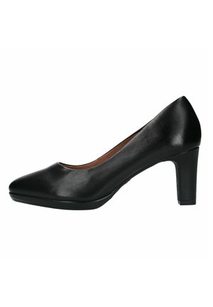 Black leather high-heeled pump with a pointed toe, smooth texture, and a sturdy block heel for stability. Interior features a brown lining.