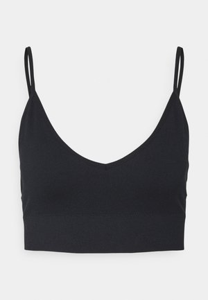 Black seamless bralette with a v-neckline, thin adjustable straps, and a smooth texture. Simple design without any patterns or embellishments.