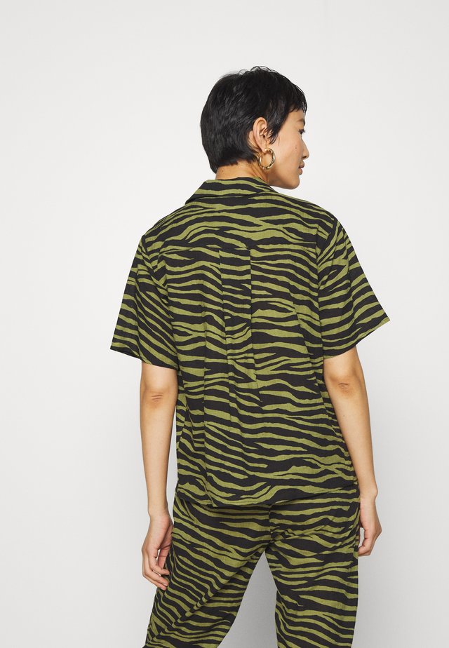 Vero moda shirts sale dooney and bourke york bra