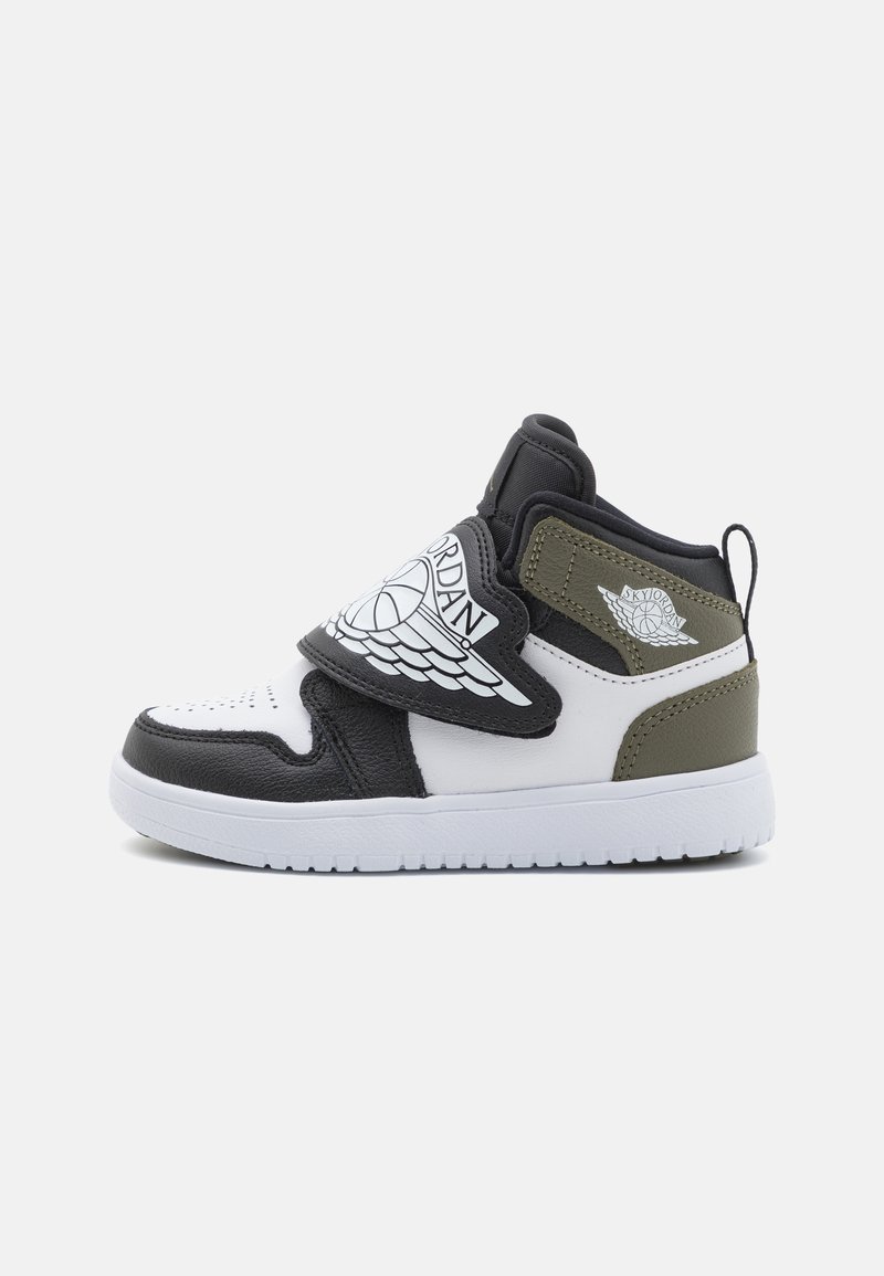 Black, white, and olive green sneaker with a high-top design, leather and fabric materials, perforated toe, and adjustable strap featuring logo.