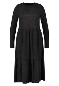 Robe à manches longues en maille côtelée de couleur gris foncé, avec un ourlet à volants et un col rond, fabriquée dans un tissu doux et texturé.