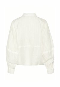 Short-sleeve, cropped shirt in sheer white fabric with subtle vertical stripes, a collar, and buttoned cuffs.