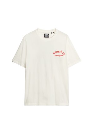 White cotton t-shirt featuring a red printed logo reading "superdry los angeles" on the left chest. Short sleeves and crew neckline.