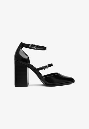 Jenny, Højhælede pumps - black