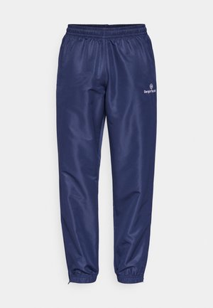 Navy sports pants with elastic waistband and cuffs. Made of smooth, lightweight fabric. Features a small logo on the side.