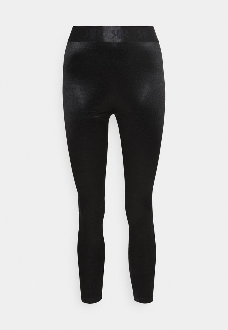 Leggings neri con finitura lucida, dotati di un ampio elastico con marchio in rilievo. Design aderente, texture liscia, taglio a lunghezza intera.