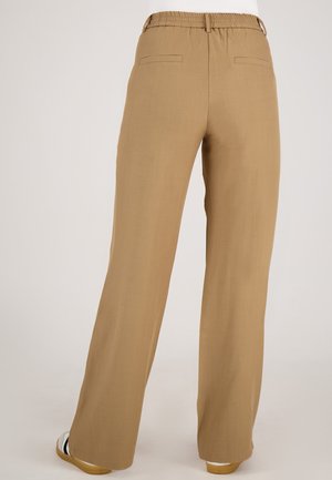 Bruine wijde broek met een elastische tailleband, twee achterzakken en een gladde structuur. De stof is lichtgewicht en casual samengesteld.