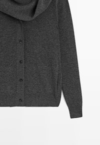 Dark gray knit cardigan with buttons down front, long sleeves, side pockets, and a loose cowl neck collar.