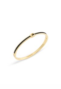 Bracelet en or avec une fine bande d'émail noir et un accent métallique circulaire. Présente un design épuré et minimaliste.