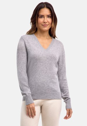 Maglione grigio a V realizzato in materiale morbido, con maniche lunghe e polsini e orlo a costine per un aspetto aderente.