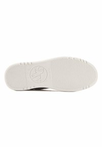 Shoe sole with a white rubber construction, featuring a textured surface and ribbed patterns. Logo embossed on the arch area.