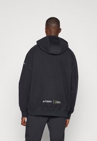 Adidas Terrex NATIONAL GEOGRAPHIC AERO.READY_WARMING HOODY - Felpa con cappuccio - black
