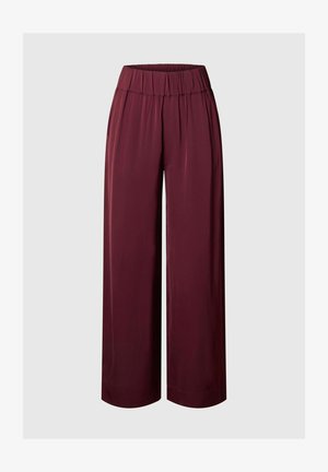 Burgundia laiad püksid stretchy ehk veniva elastse vöökohtaga ja siledast, läikivast materjalist. Ilma nähtavate kinnituste või taskuteta.