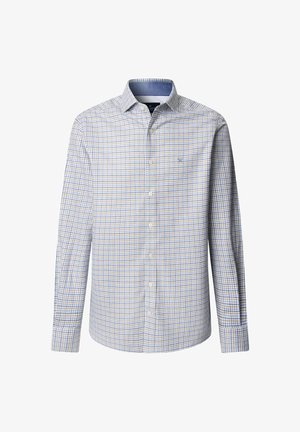 Biele tričko s dlhým rukávom s modro-žltým kockovaným vzorom. Má golier s gombíkmi a jednu náprsní vrecko. Bavlnená látka.