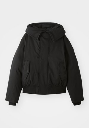 Black padded jacket with a high collar, zip closure, double side pockets, elastic cuffs, and a cropped hem. Smooth, matte texture.