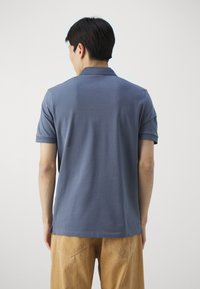 HUGO DERESO - Poloskjorter - open blue