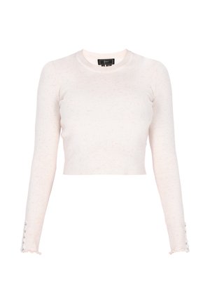 Vaaleanpunainen ribattu pitkähihainen crop-top, joka on valmistettu pehmeästä materiaalista. Hihansuissa on röyhelöt ja koristeelliset napit.