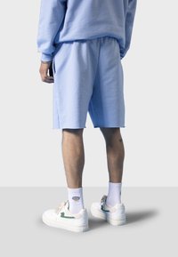 Kaotiko KANYE UNISEX - Shorts - light blue