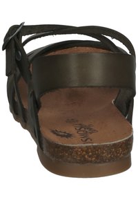 Brown leather sandals with multiple straps, a textured cork footbed, and a rubber sole. Adjustable buckle detail on the side.