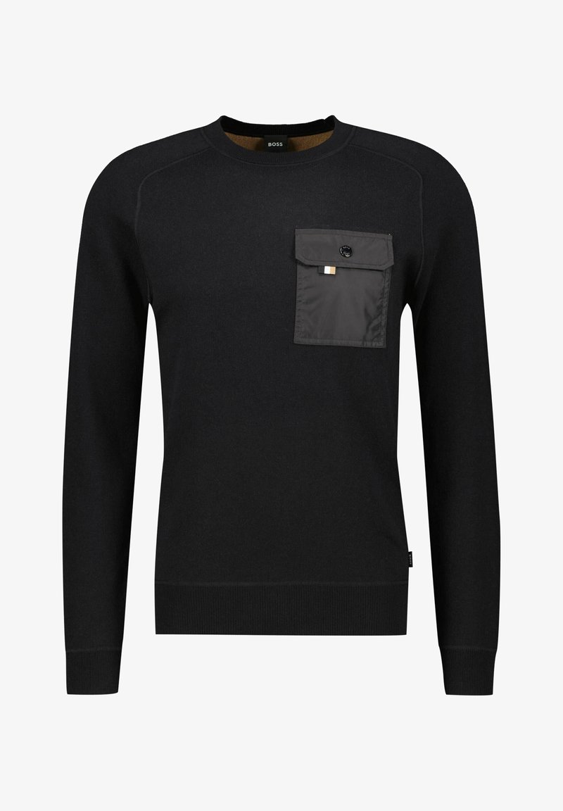 Pull noir à manches longues avec col rond, poignets et ourlet côtelés, avec une poche poitrine à boutons en tissu lisse contrastant.
