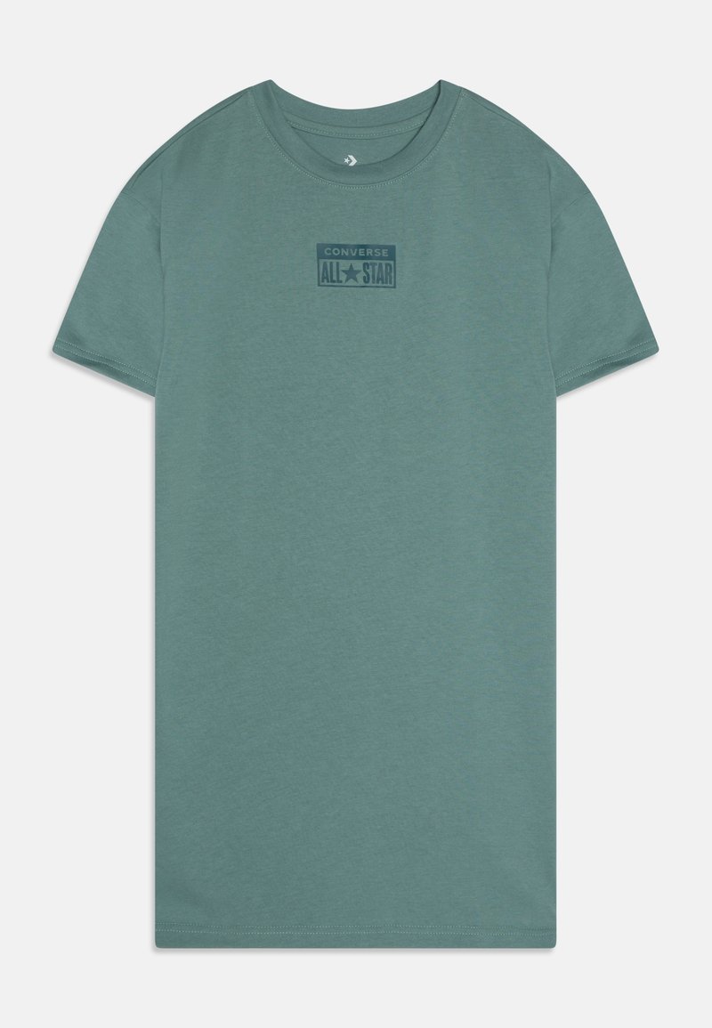 T-shirt vert à manches courtes avec col rond et logo "Converse All Star" vert foncé centré sur la poitrine.