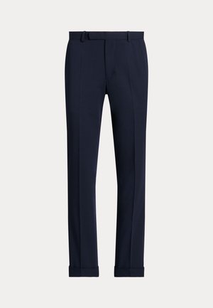 Pantaloni tailored blu navy con una superficie liscia, dotati di cintura in vita, pieghe e orli con risvolto per una vestibilità strutturata.
