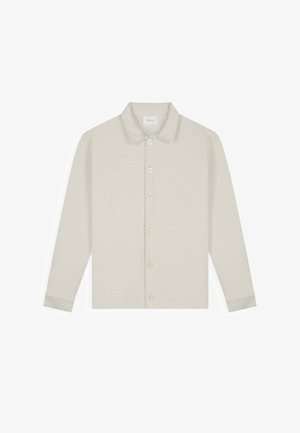 Lichtbeige overhemd met lange mouwen, subtiel textuurpatroon en klassieke kraag. Voorzien van zes knopen aan de voorkant.