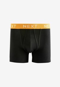 Črne bokserice z rumenim pasom, na katerem je v belem napisan "NEXT". Tkanina deluje gladko, z oprijetim prileganjem in ravnimi šivi.